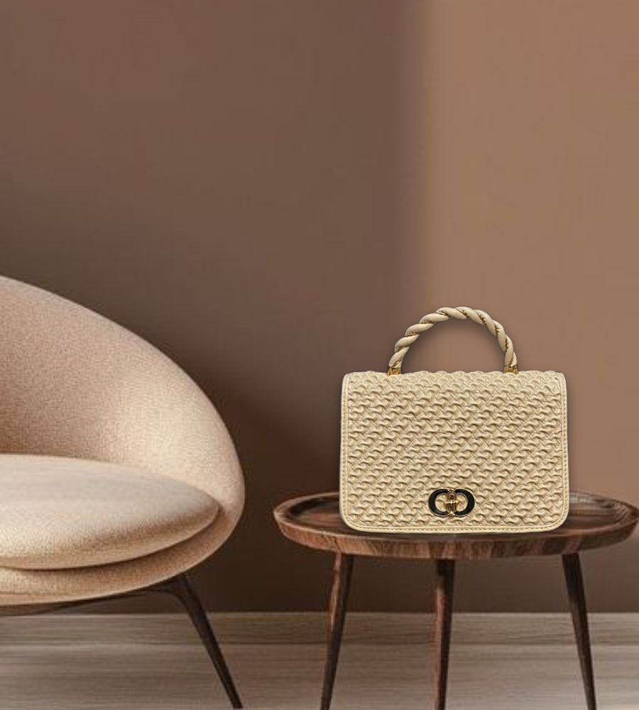 Cream woven-textured top-handle bag with a braided handle and gold buckle